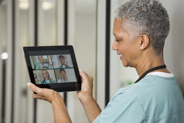 doctor using digital tablet in hospital